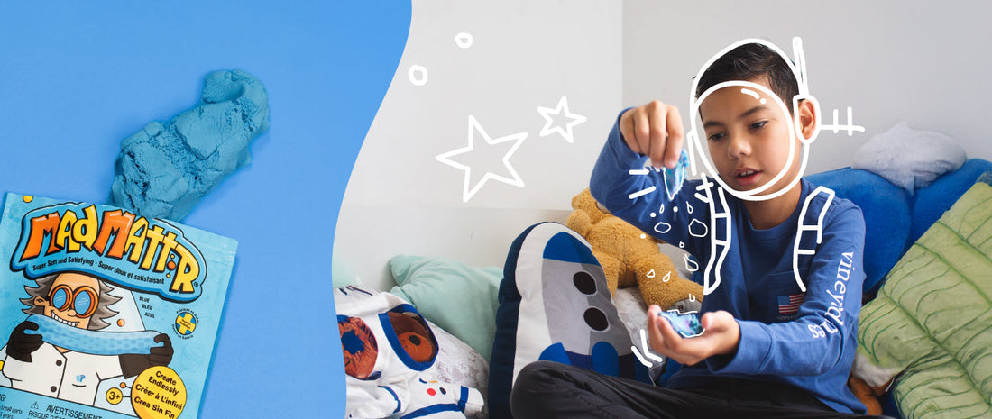 Child playing with Mad Mattr sensory dough, holding a creative shape, next to Mad Mattr packaging.